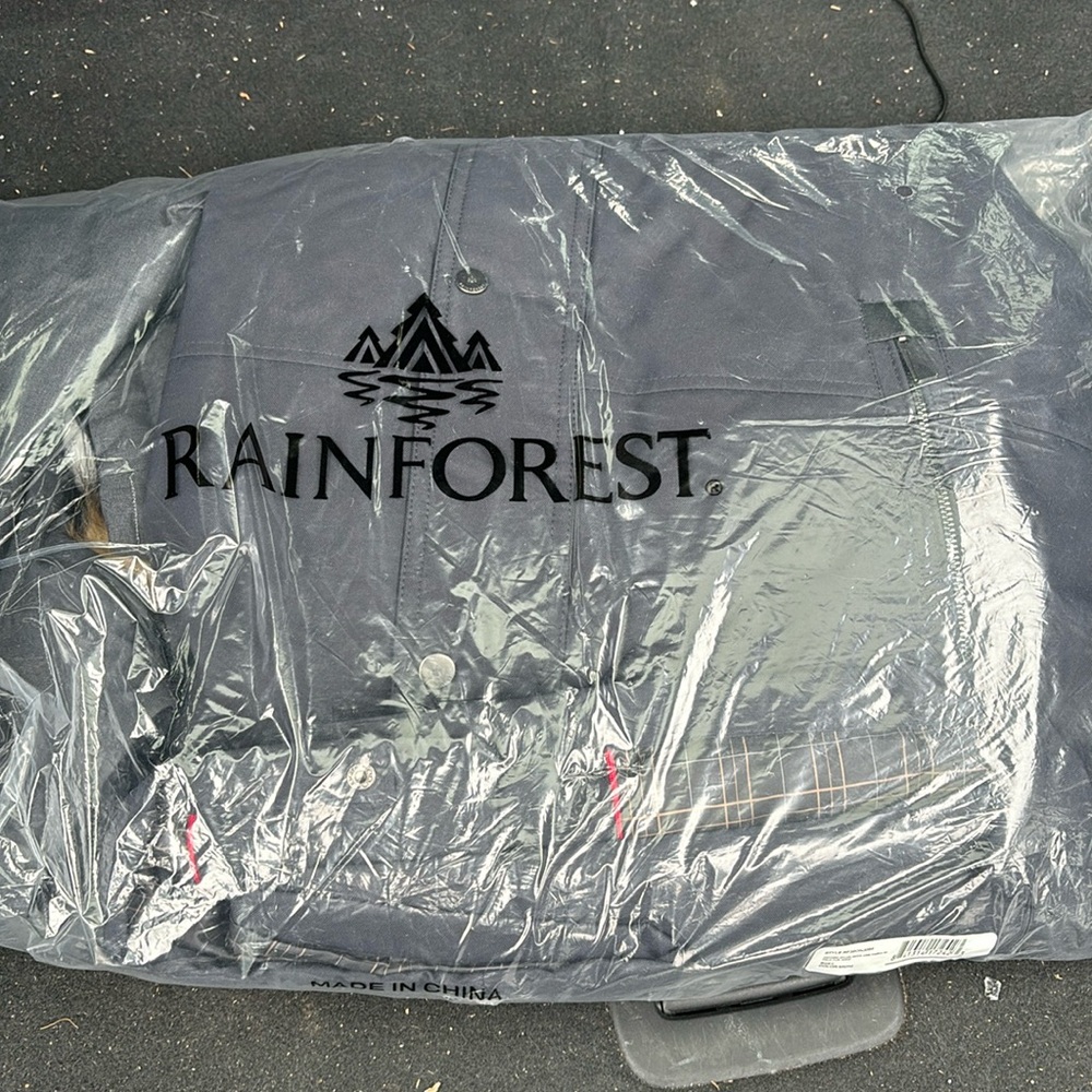 Rain forest jacket for sale . Size L dark blue and gray $150
